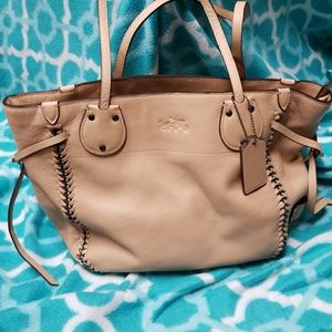 Tan coach handbag